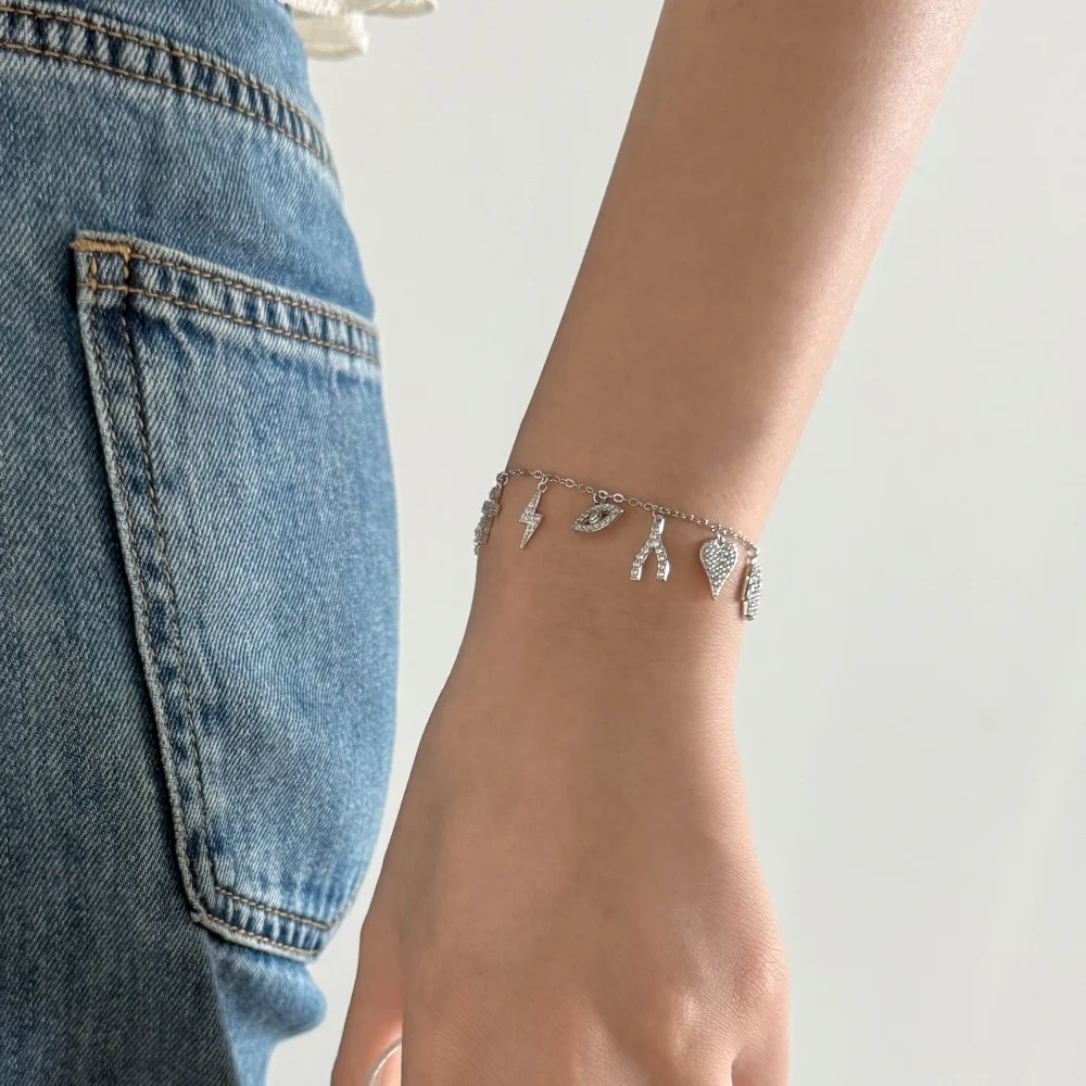 KAKODIY unique design 925 Sterling Silver multiple symbols octagonal thunder evil heart hand eye Y letter shape pendant zirconia bracelet detail 3