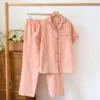 Set pantaloni rosa sakura a maniche corte