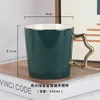 Gold handle with dark green