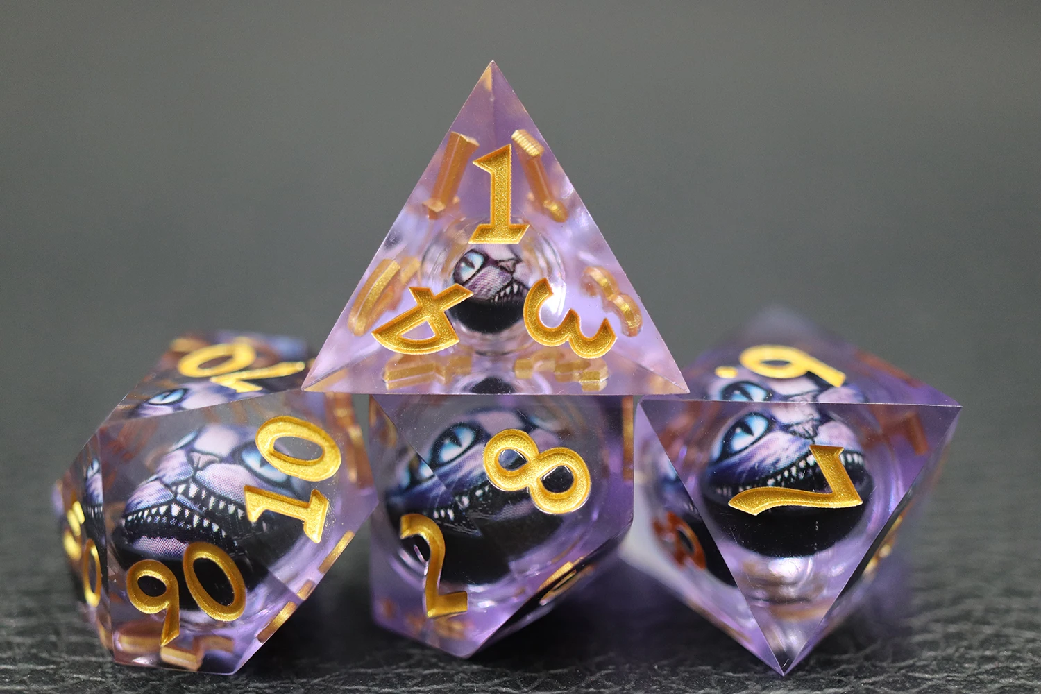 Wholesale Bulk 7Pcs Polyhedral Purple Cat Face Dice Set Transparent Resin with Gold Number D4-D20 Sharp Edge supplier