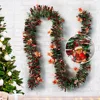 Guirnalda de oropel de oso navideño (hombre de jengibre)