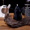 Warmly embrace the black ghost scented candle