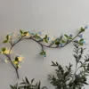 Green with blue flowers