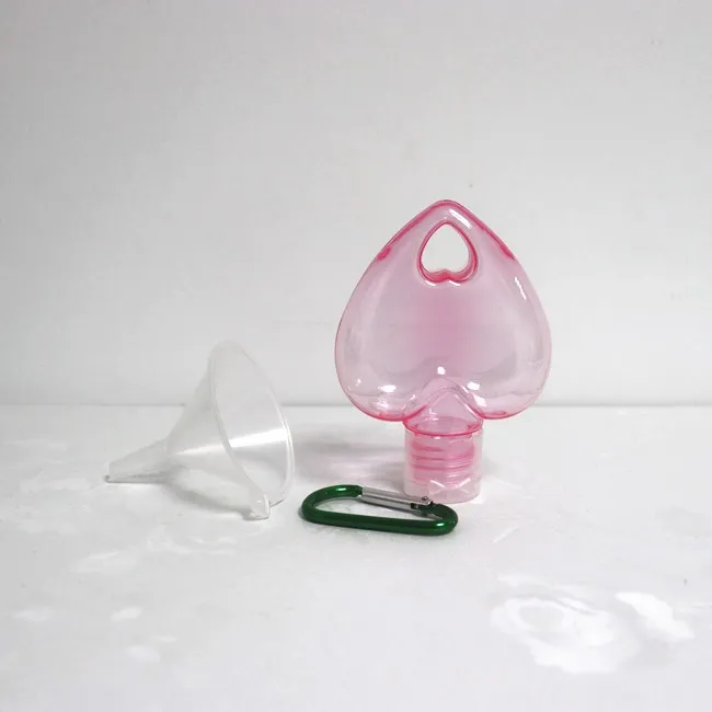 2025 Custom PETG Heart Shape Empty Hand Sanitizer Bottle with Hook 50ml Plastic Gel Bottle with Keychain