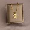 Collana in acciaio al titanio con girasole dorato