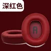 Paraorecchie in pelle rosso intenso con scritta in rilievo