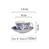 white cup and saucer