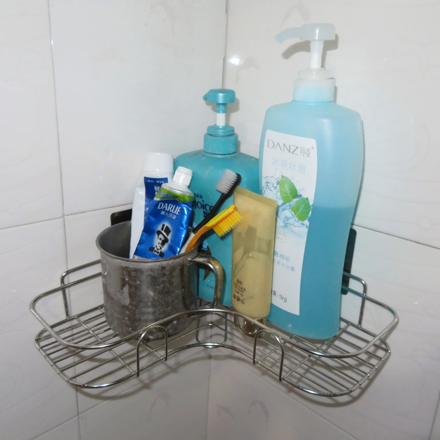 Stainless Steel Triangle Shelving Iron Plating Corner Storage Basket Corner Arrangement Storage Rack supplier