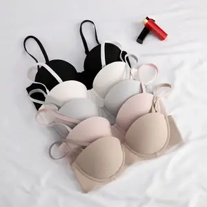 Factory direct comfortable bra ladies solid color tube top underwear breathable cross strap detachable sexy style adults.