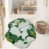 Irregularly shaped flocked floor mat - white and green