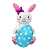 Lapin blanc gonflable de 4FT tenant l'oeuf de Pâques
