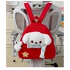 Red backpack charm