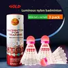 White balls with red lights. 3 in a pack