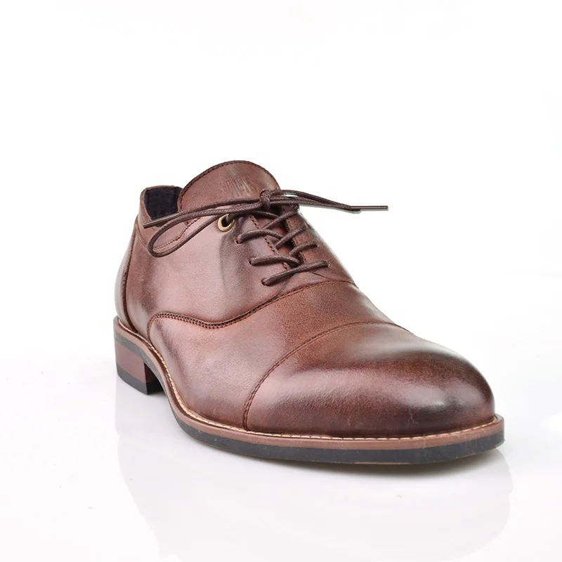 Cognac hoge sneakers met donkerblauwe details - Heren | MANFIELD