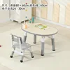 A table and chair in wood grain gray.