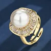 Bague ouverte en or blanc avec perle