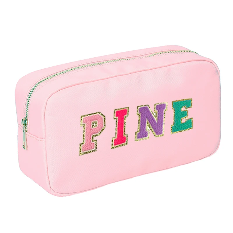 Wholesale Fashion smile design cosmetic bag pink private label