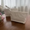 Horizontal white zipper bag