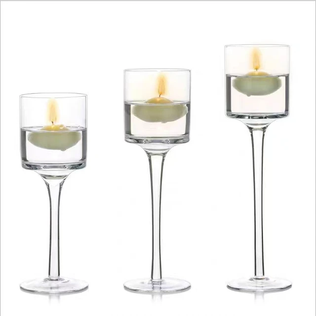 A set of three elegant tea lights glass candlelight candlelight dinner wedding Christmas table center