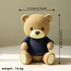 Orsetto di peluche con maglione marrone-blu