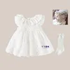 White mesh slip dress + lace hat + white mid-calf socks