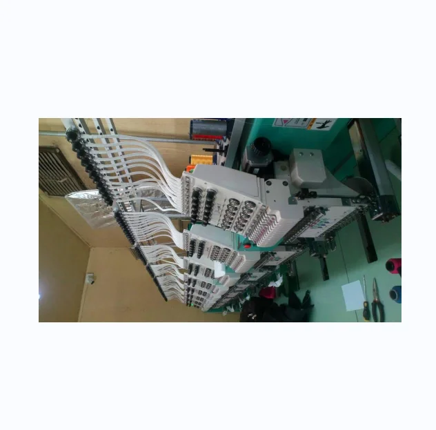 Tajima Embroidery Machines with a Backdrop of Isacord Thread