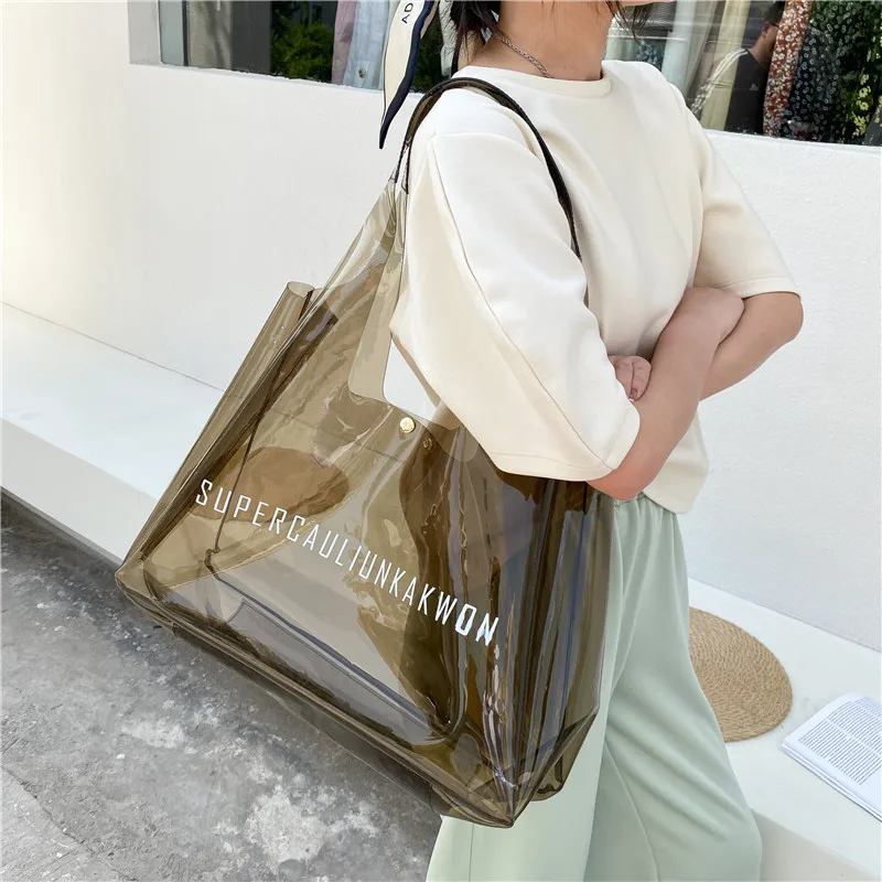 Reasuble Eco Large Waterproof Vinyl Jelly Clear Shopping Handbag Custom  Transparent Neon Plastic PVC Tote Beach Bag - China Reusable Bag, Tote Bag