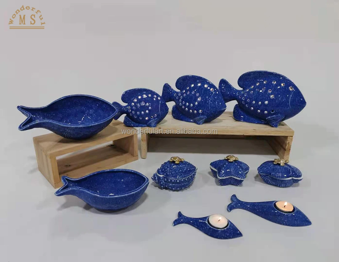 Factory price ocean style ceramic candle holder unique candle vessels blue sea snail fish shaped candle container