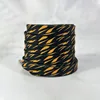 Estampado de leopardo negro y marrón rojizo