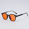 Black with orange lens
