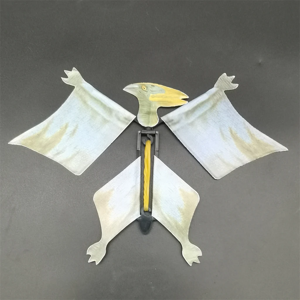 Wind up magic rubber band paper flying dinosaur toy