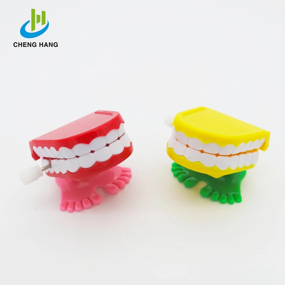 Kids Funny Wind Up Toys Clockwork Jumping Teeth For Halloween Gift