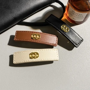 Designer Brand's New Light Luxury Letter Leather Spring Clip Mesh Hair Clip for Women, High-end Side Bangs Hair Clip.