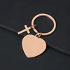 Llavero con cruz de corazón de 30 mm - oro rosa