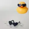 Lunettes de soleil noires en forme de coeur
