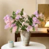 3 pink and 3 light purple medium-sized vintage wabi-sabi bottles