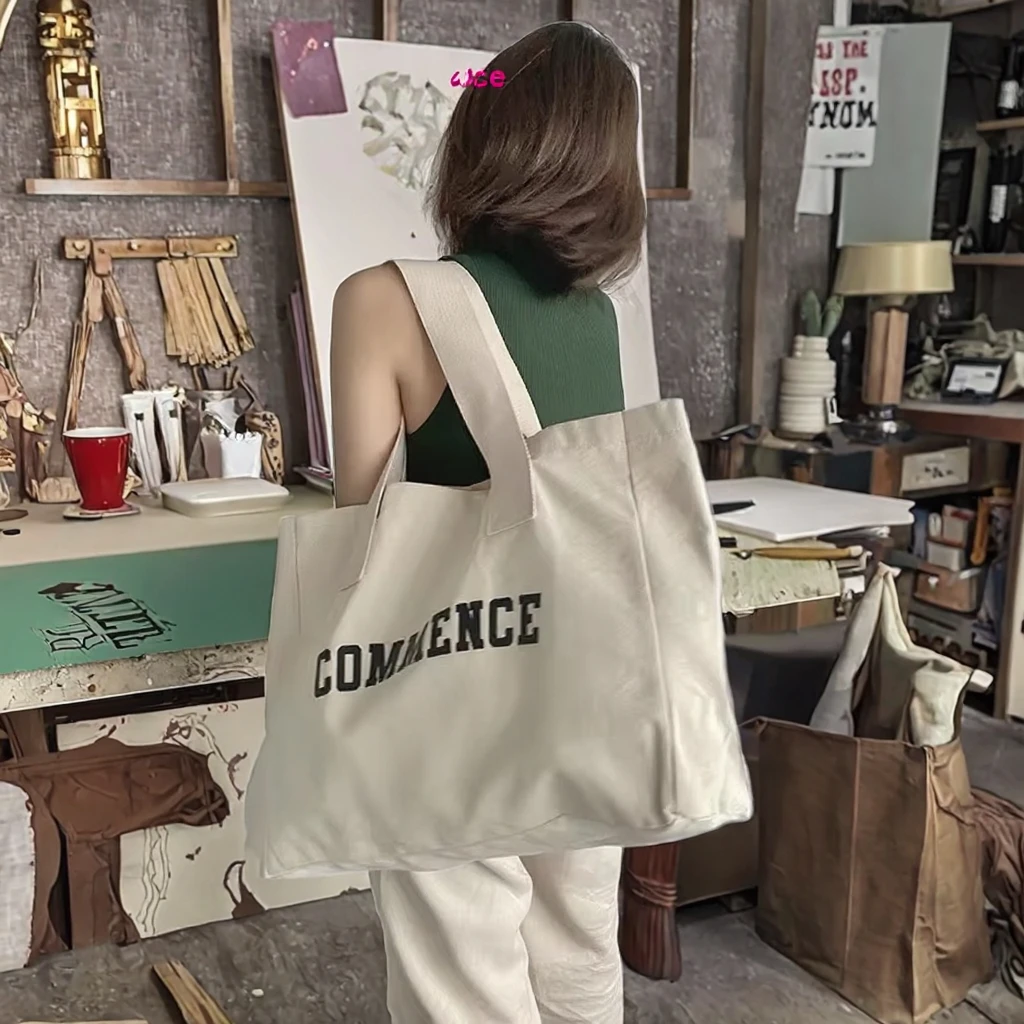 Women's Large Reusable Cotton Canvas Tote Shopping Bag with Custom Logo Zipper Pockets Long Rope Handle manufacture