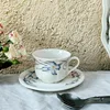 Taza de café con diseño floral de 350 ml + plato de 17 cm.