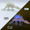 Estegosaurio luminoso blanco de 18 cm de largo.
