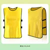 Avec uniforme jaune pour la compétition
