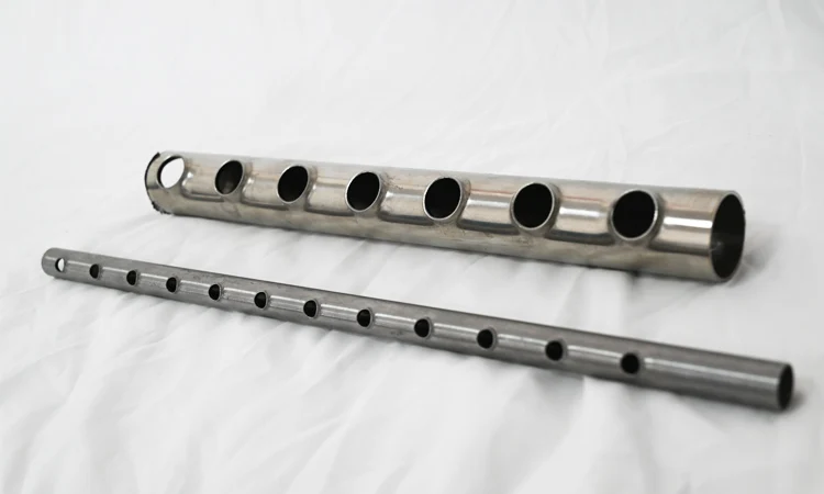 BOBO Machine automatic metal copper pipe hole punching and flanging shown in a detail photo for this news article