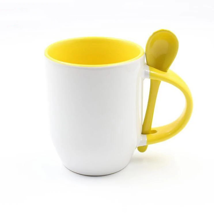 Colorful ceramic mugs with spoons for sublimation