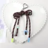Love buckle brown pendant
