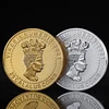 Monedas conmemorativas chapadas en oro y plata