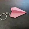 Llavero de avión de papel - rosa
