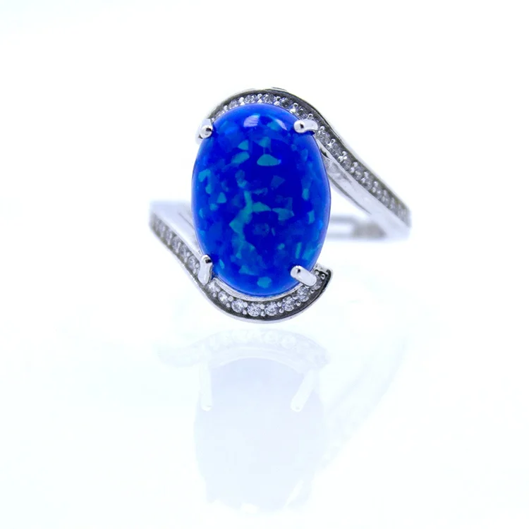 STERLING DIAMOND AND BLUE FIRE OPAL RINGS.M-O .UK