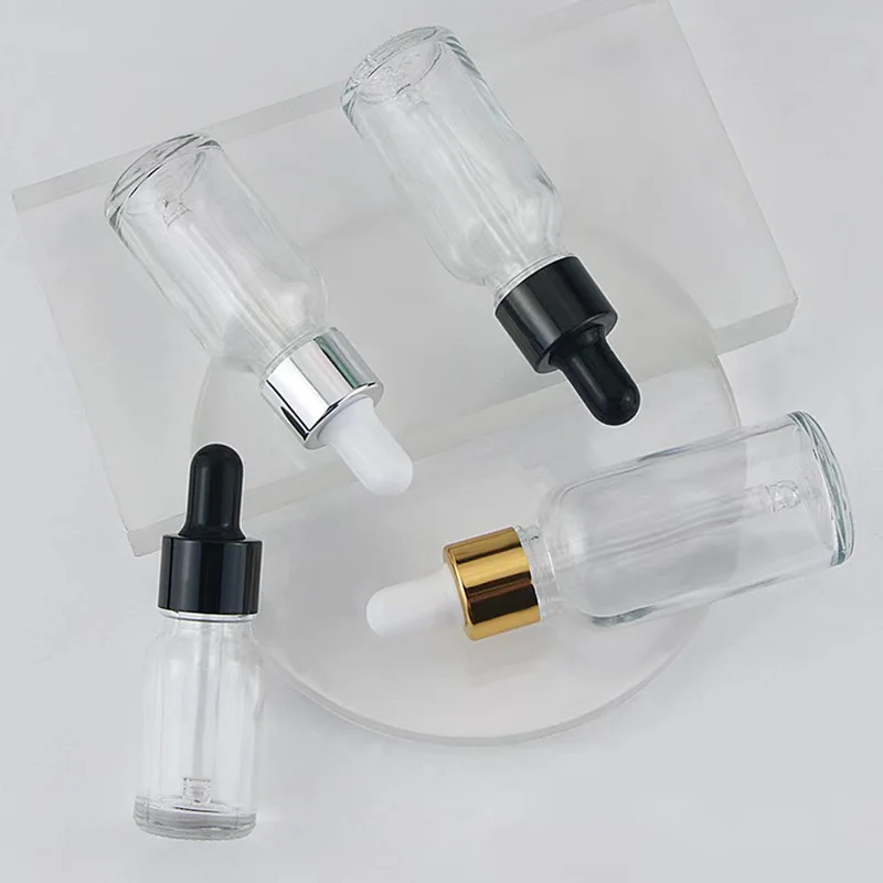 Custom Logo 5ml-100ml Amber Glass Essential Oil Bottles for Personal Care Skin Care Serum Cosmetic Glass Bamboo Dropper manufacture