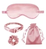 Antifaz rosa para ojos, cinta para el pelo, gomas para el pelo y bolsa.