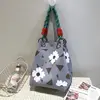 Sac à main marguerite blanche