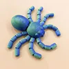 Araña azul verde 11,5cm con atracción magnética